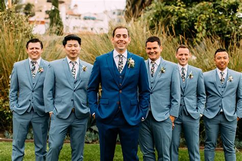 dusty blue groomsmen suits.